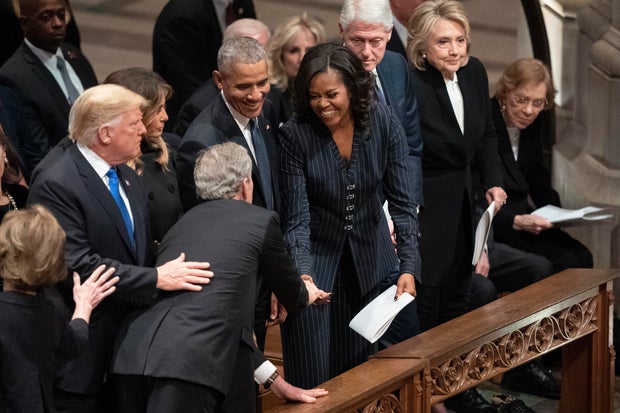 A Unlikely Friendship: George W. Bush and Michelle Obama Share Moments at Funerals