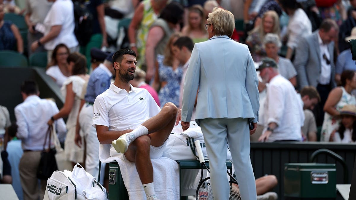 Novak Djokovic Triumphs in Record Quarterfinal Amid Roof Debate