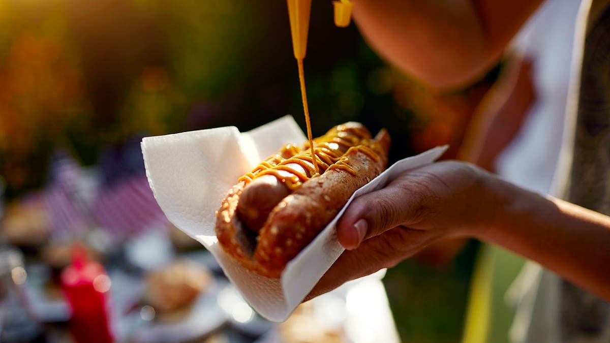 National Hot Dog Day Celebrations with Dogs Out Founders