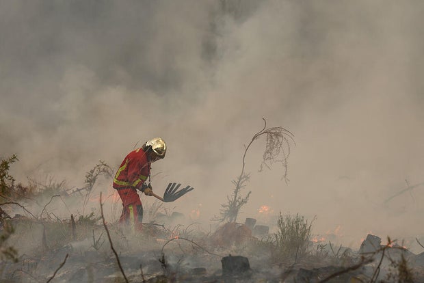 Wildfires Force Mass Evacuations in France and Spain