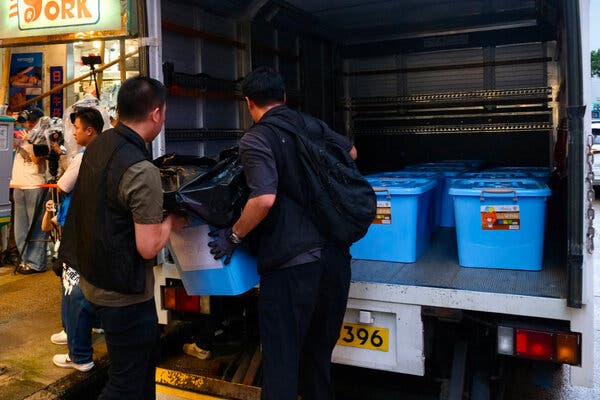 Hong Kong Security Police Raid Bookstores Amid Sedition Crackdown