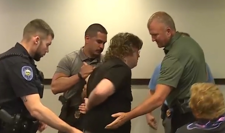 Kansas Teacher Arrested for Disrupting Data Center Hearing Vows to Continue Advocacy