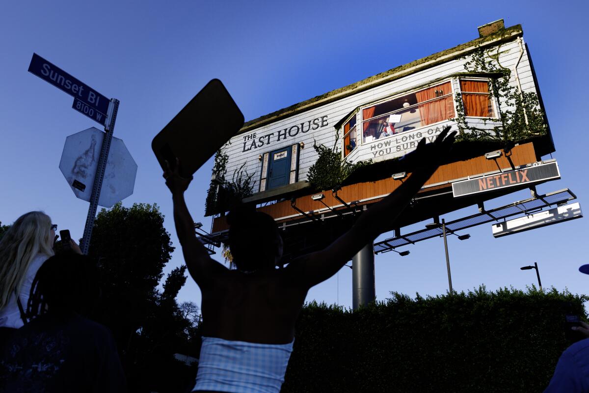 Creative Billboard Promotion for Netflix Film Draws Crowds in West Hollywood