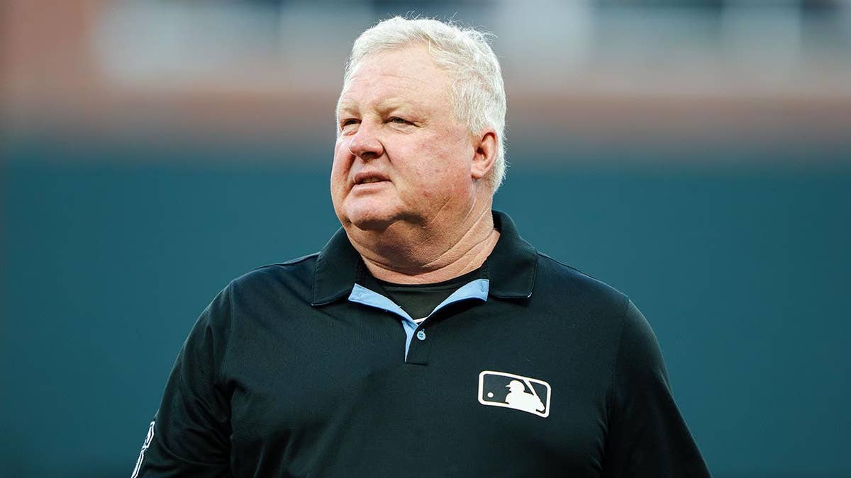 Cincinnati Reds Celebrate Victory Amid Umpire Challenges