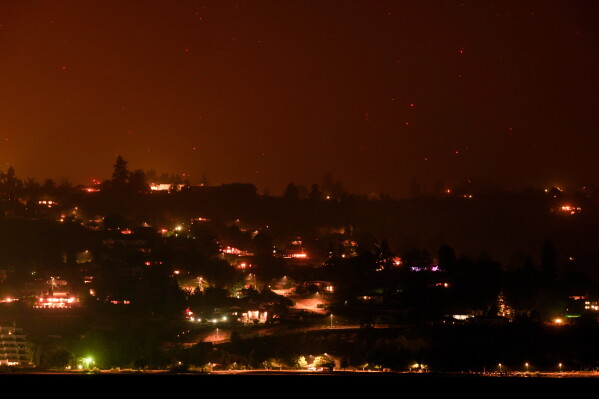 Wildfires Prompt Evacuations As Flames Destroy Homes In Western U.S. and Canada
