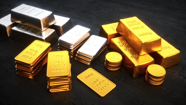 Impact of Federal Reserve Rate Decision on Gold and Silver Prices