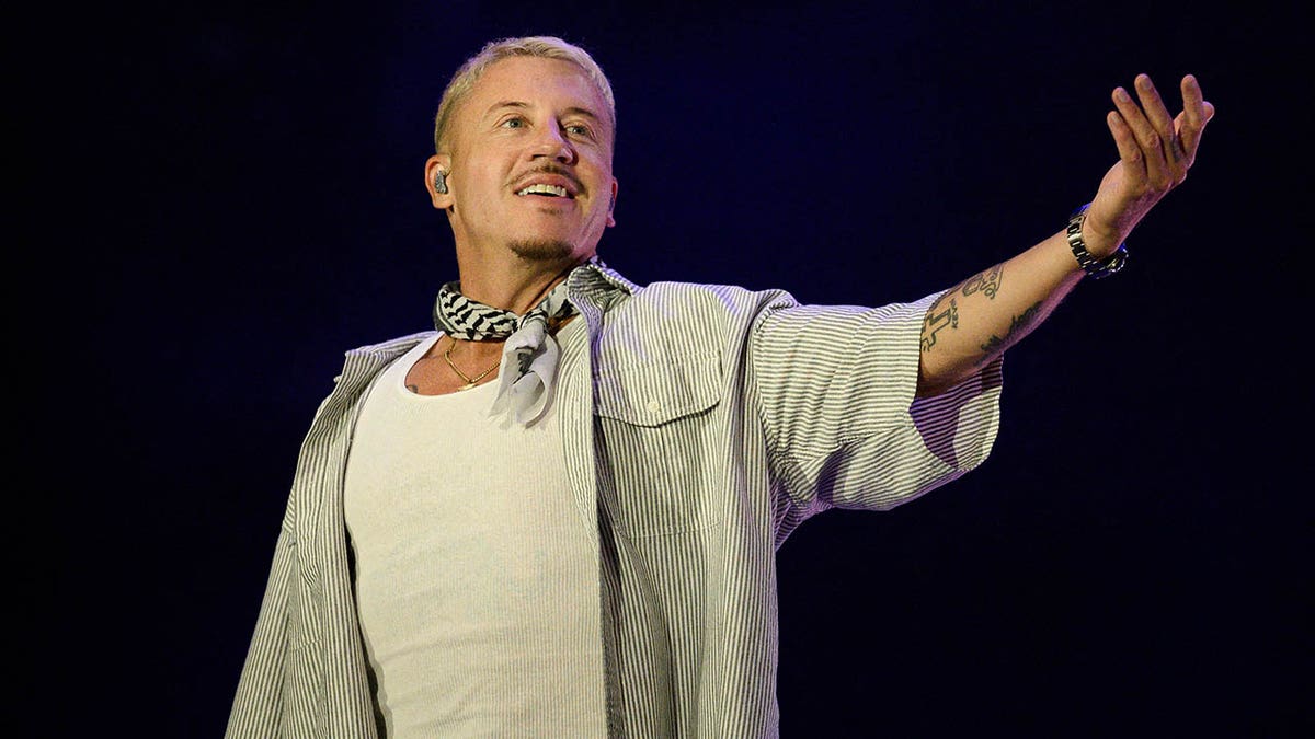 Macklemore Removed From Ed Sheeran Tour Over Political Speech