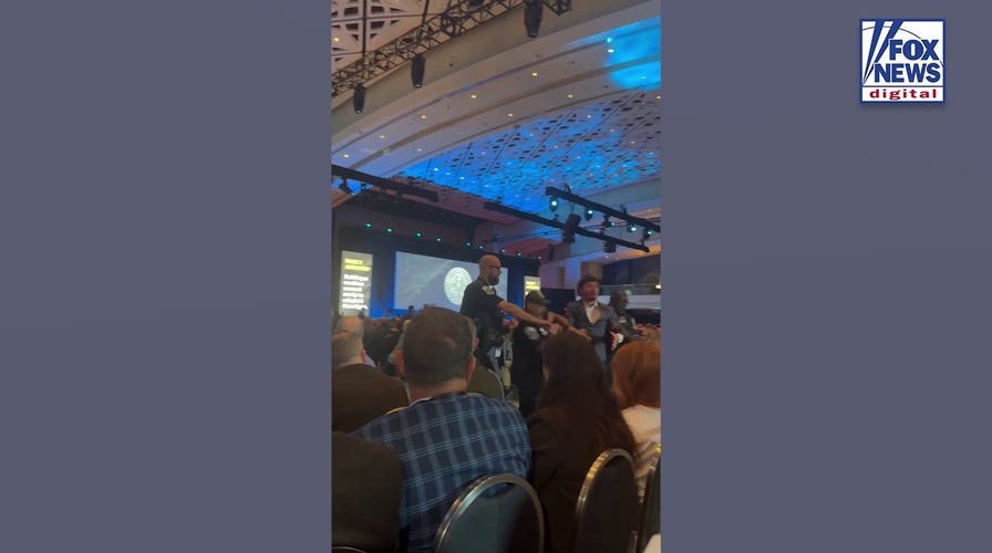 Protesters Disrupt War Secretary at Military Conference