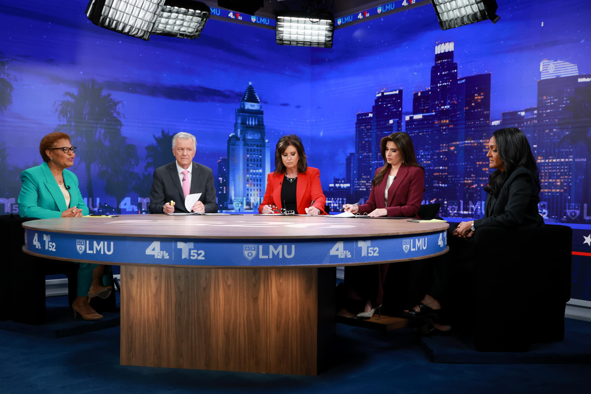 Bass and Raman Engage in Heated Debate Ahead of Upcoming Election